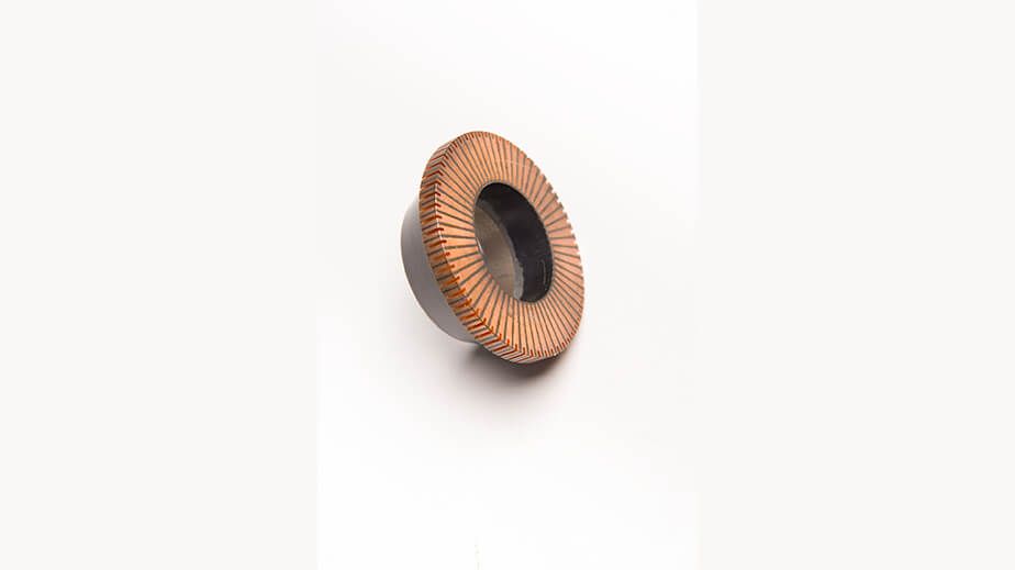 Commutators with risers for electric motors